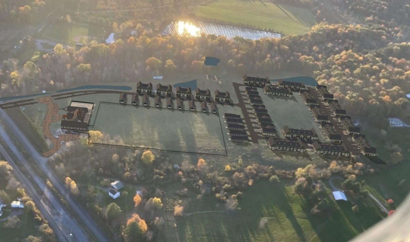 Aerial looking west with proposed buildings